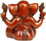 Brass Ganesha statue back view, seated pose, large ears, orange-brown finish