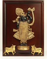 Brass Shrinath Ji idol wall hanging in wooden frame with two decorated cows at base