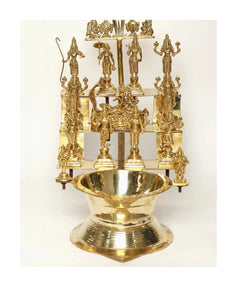 Brass oil lamp with Vishnu Dashavatar figures and central oil bowl, 19 inches