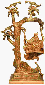 Handmade brass Radha-Krishna swing statue with raised tree and decorative birds, 16 in