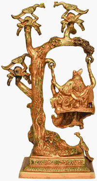 Handmade brass Radha-Krishna swing statue with raised tree and decorative birds, 16 in