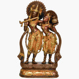 Handcrafted brass Radha-Krishna statue holding flute, ornate pedestal base