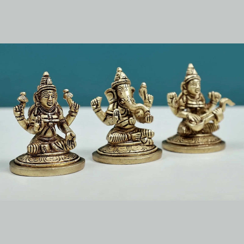 Brass Set of three small statues of Ganesha, Lakshmi, and Saraswati (Height: 2 inches)