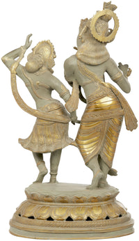 Brass Radha-Krishna sculpture, side view of dancing pair with raised arms