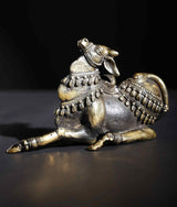 Seated Nandi idol brass figure, detailed headgear and garland-like trim on saddle