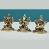 Brass seated Ganesha, Lakshmi & Saraswati mini statues set, 2 in height