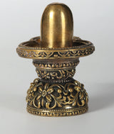 2-inch small brass Shiva linga idol, engraved lotus-style base and floral accents