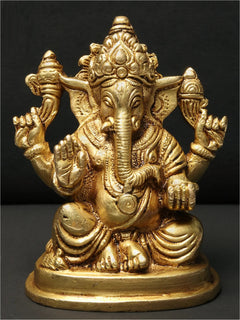 Brass Lord Ganapati statue with four arms, seated pose, 5-inch