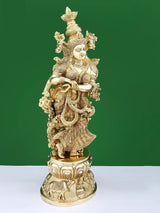 Handmade brass Radha Rani statue, side view with raised hands and detailed attire