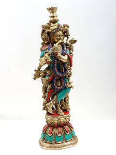 Brass Krishna flute statue with ornate crown and colorful bead inlay, full height