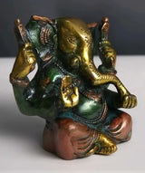 3-inch brass Ganpati statue, seated pose, gold accents on crown and arms