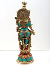 Back view of handmade brass Krishna flute sculpture with teal inlay and ornate detailing