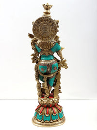 Back view of handmade brass Krishna flute sculpture with teal inlay and ornate detailing