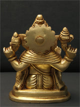 Back view brass Ganapati idol with detailed ornaments and circular backplate, 5-inch