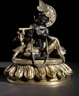 Brass seated Krishna statue with flute and cow figure, 8-inch