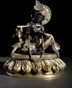 Brass seated Krishna statue with flute and cow figure, 8-inch