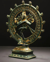Green patina brass Shiva Nataraja figurine on pedestal, ornate halo with arms