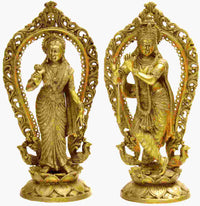 Brass Radha and Krishna statue, 16-inch, gold-toned figures under ornate arch