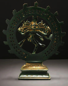 Green patina brass Nataraja idol from the side, detailed halo pattern and legs
