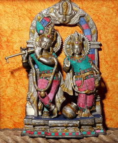 Handcrafted brass statue of Radha and Krishna, seated pair with ornate arch