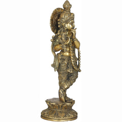 Brass Krishna divine flutist sculpture in side view, detailed patterned clothing