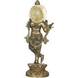 Back view brass Krishna statue with flute, ornate round back and engraved base