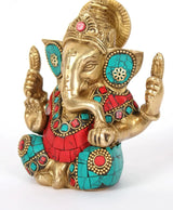 Brass Ganapati idol seated with raised hands; turquoise and red inlay detailing