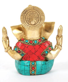 Seated Ganapati brass idol back view with spiral halo; red and turquoise inlay