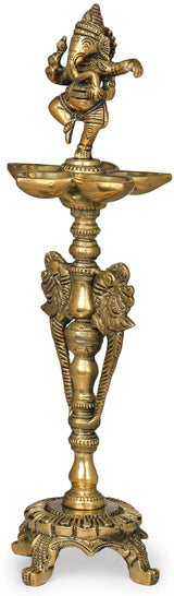 Brass Ganesha lamp, deity on wide bowl atop ornate trident-like stand