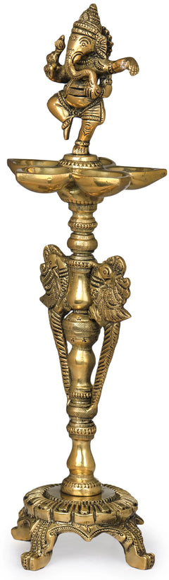 Brass Ganesha lamp, deity on wide bowl atop ornate trident-like stand