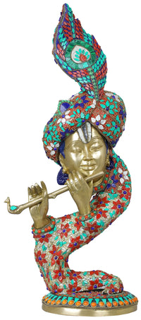 Handmade brass Krishna flute sculpture with colorful mosaic, seated figure holding flute