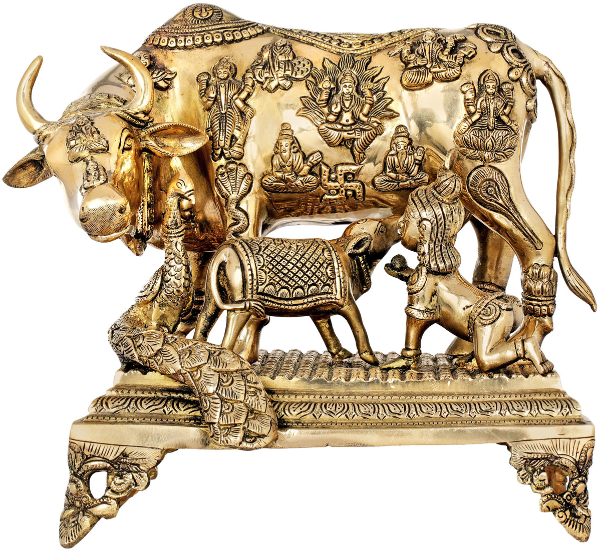 Handmade brass cow sculpture with deity relief panels and ornate stand