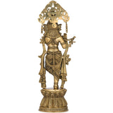 Brass Krishna sculpture from back view, ornate crown and waist detailing, flute gesture.