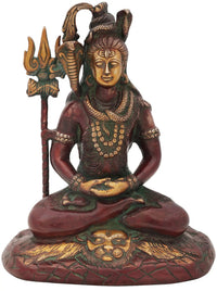 Red and green seated Shiva idol holding trident, ornate brass statue, 10-inch