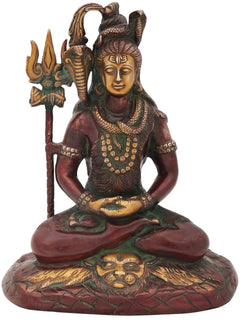 Red and green seated Shiva idol holding trident, ornate brass statue, 10-inch