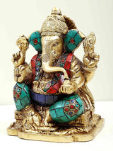 Brass Lord Ganesha figurine seated, trunk details, turquoise and red enamel accents