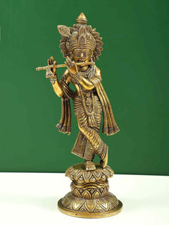 Brass standing Krishna statue holding flute, ornate crown, detailed base