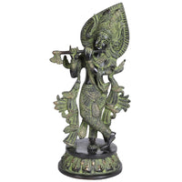 Handmade brass Krishna flute sculpture with ornate crown and draped sashes, 13 in