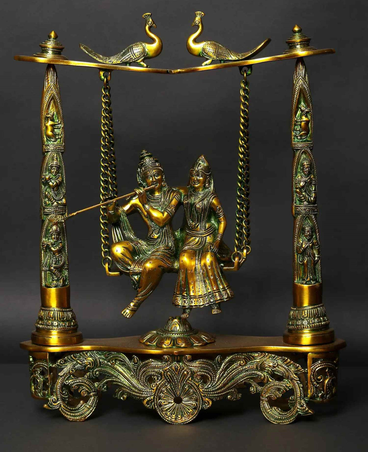 Greenish gold brass Radha Krishna statue on peacock swing with hanging chains