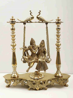 Handmade brass Radha-Krishna swing statue with peacocks, 15-inch base