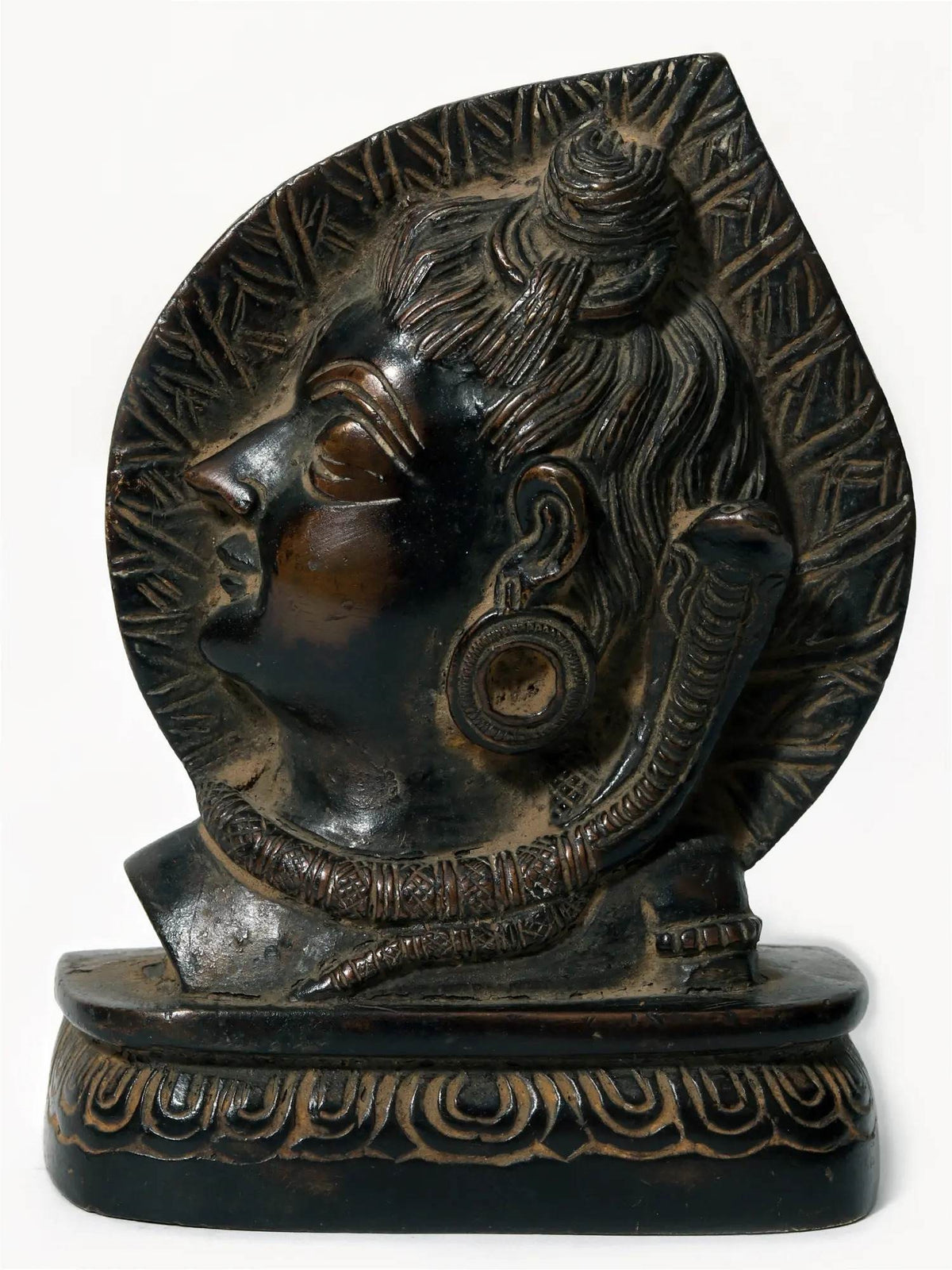 Small Lord Shiva head on leaf brass statue, dark oxidized finish, 4 in.