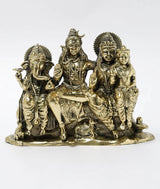 Brass statue of Lord Shiva family, 5 in, seated figures with detailed jewelry.