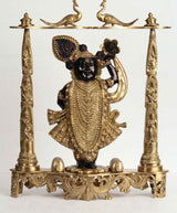 Brass deity statue with dark-faced figure, ornate pillars, 18-inch height