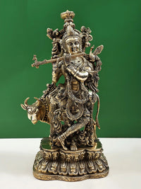 Handmade brass sculpture of Murlidhar Krishna with cow, ornate seated figure, 16 inches