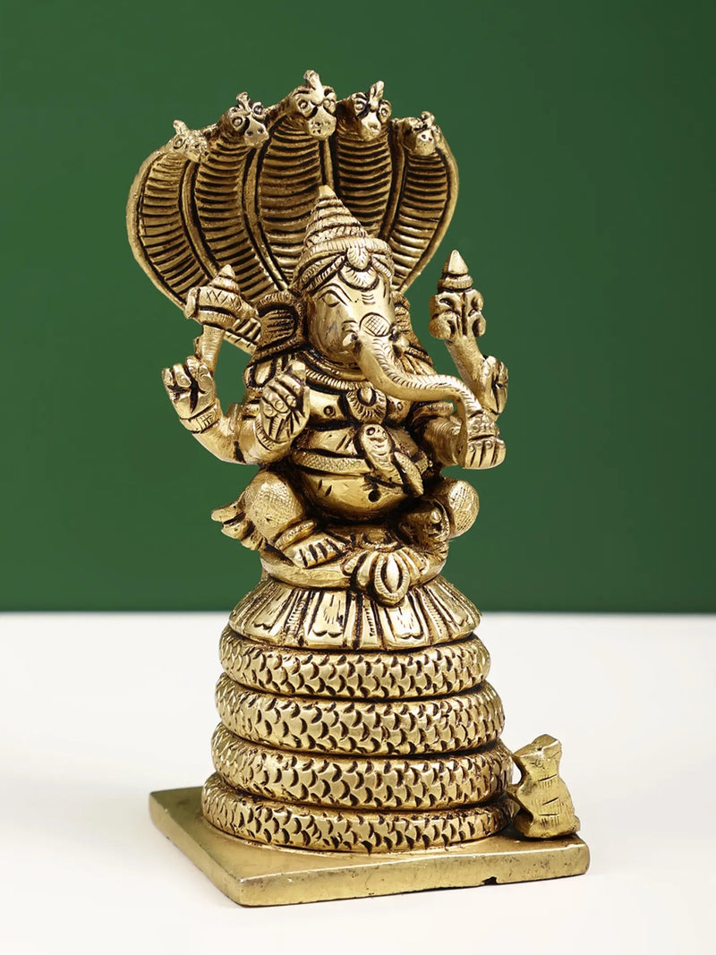 Small Brass Statue of Four-Armed Ganesha Seated on a Five-Hooded Serpent 4 inches