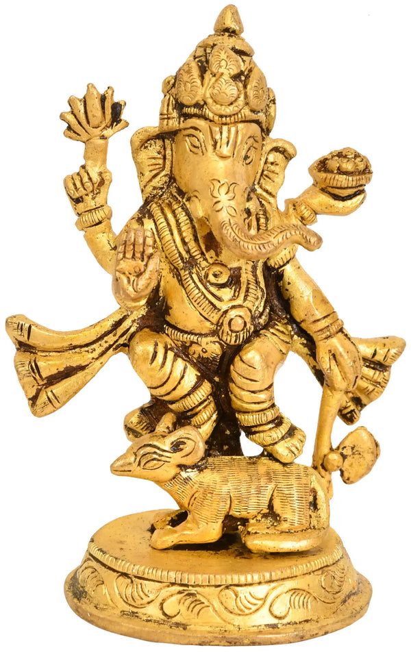 Brass statue of Lord Ganesha standing on a rat