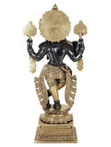 Black brass Krishna idol, back view with ornate arms and draped waist, 15 cm