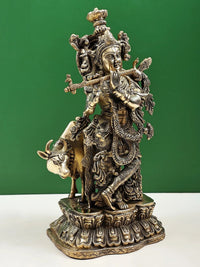 AONA handmade brass Krishna sculpture with cow, detailed jewelry and raised flute, 16 inches