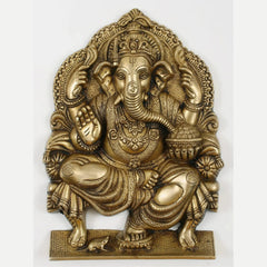 Natural brass Lord Ganesha idol seated on a throne, 11 inch