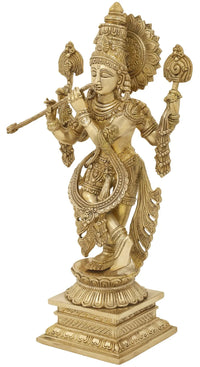 Natural brass Muralidhara statue with flute, tassels at wrists, hip sashes, 15 cm